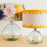 Blue floral embroidered lampshade and yellow edged embroidered lampshade