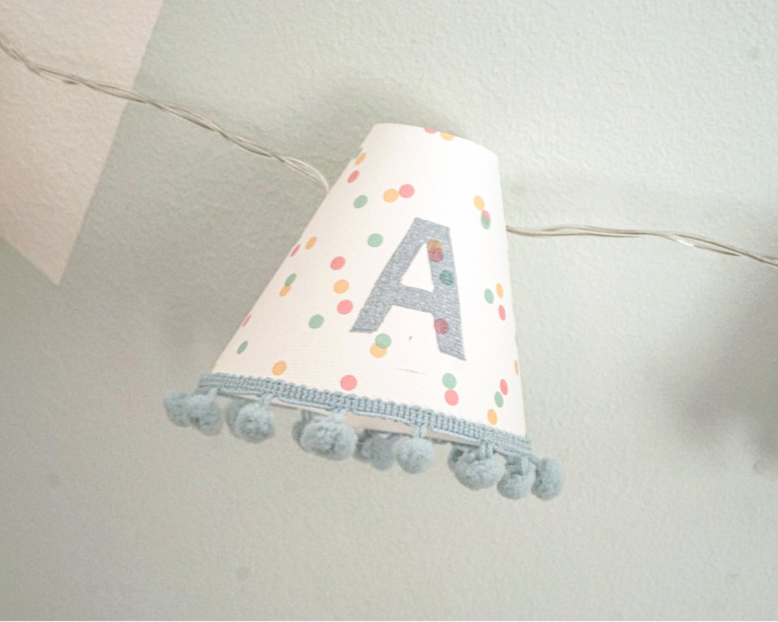 Personalised pom pom fairy lights in blue