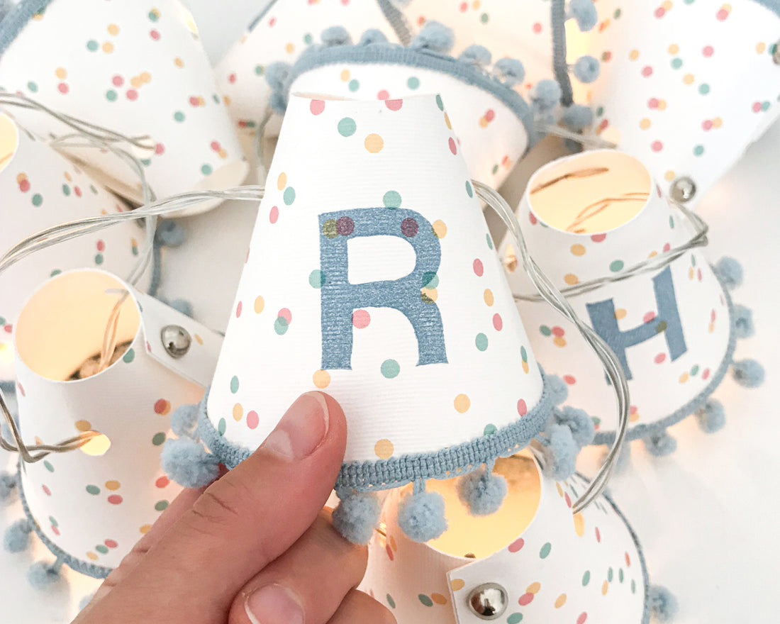 Personalised pom pom fairy lights in blue