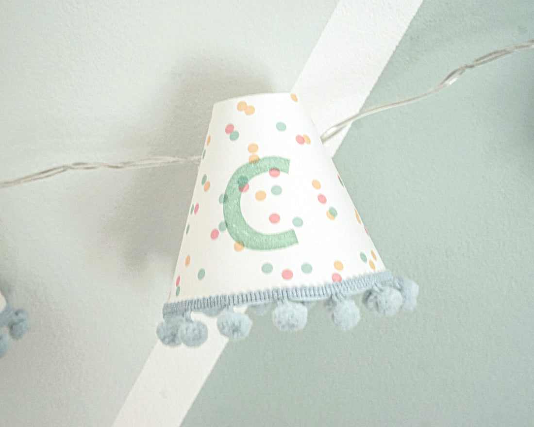 Personalised pom pom fairy lights in green