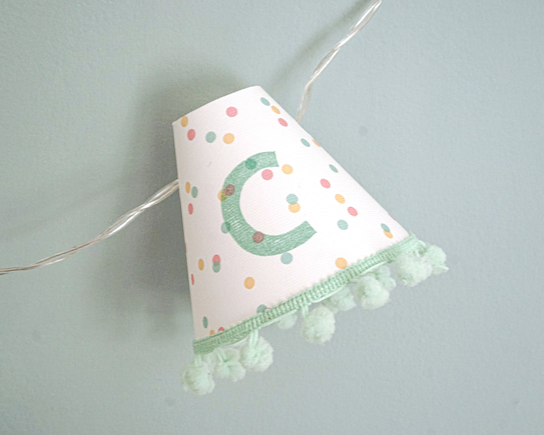 Personalised pom pom fairy lights in green