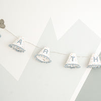 Personalised pom pom fairy lights in blue