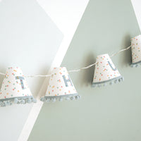 Personalised pom pom fairy lights in blue