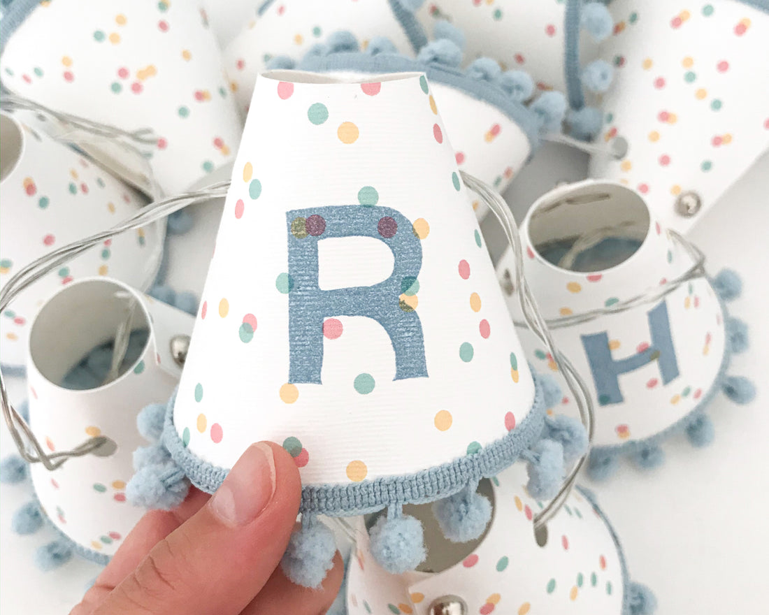 Personalised pom pom fairy lights in blue