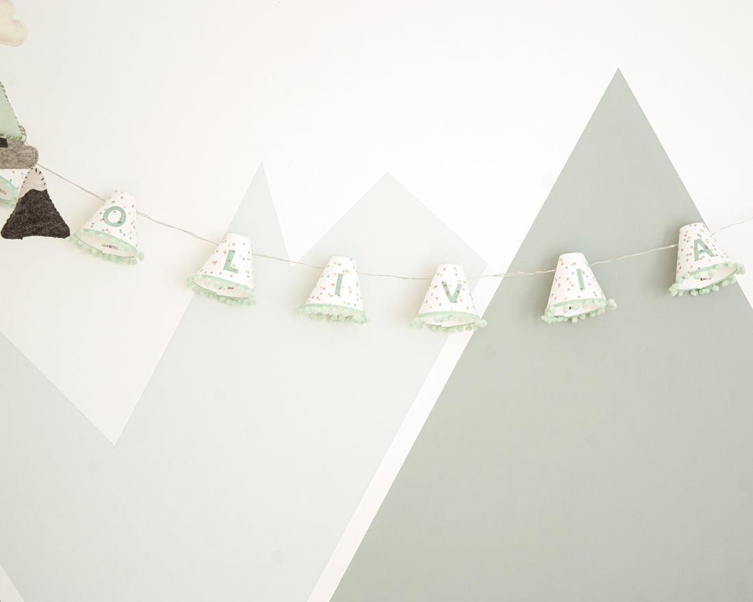 Personalised pom pom fairy lights in green