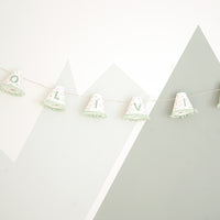 Personalised pom pom fairy lights in green