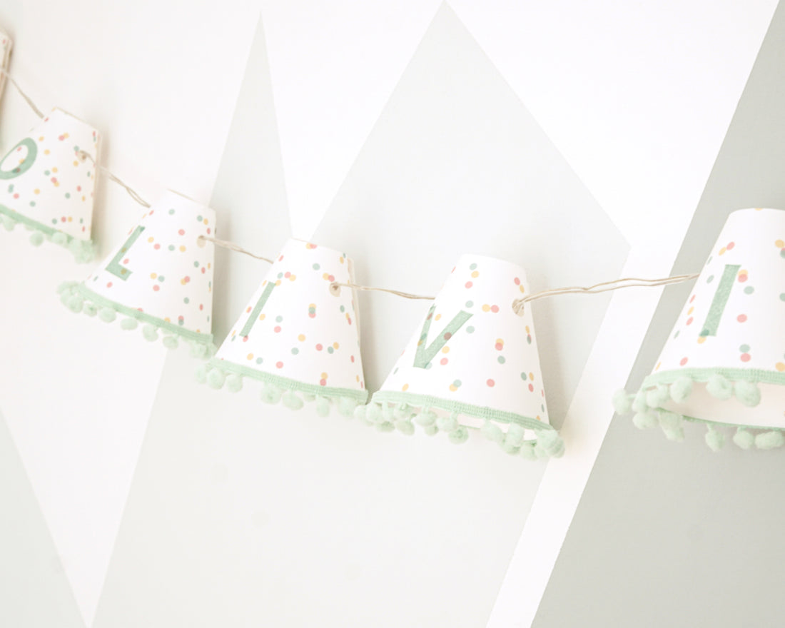 Personalised pom pom fairy lights in green