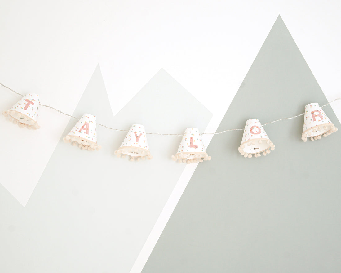 Personalised pom pom fairy lights in pink