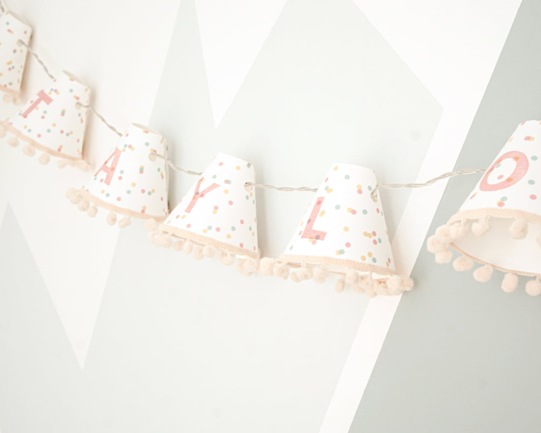 Personalised pom pom fairy lights in pink