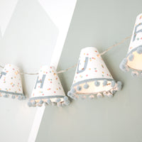Personalised pom pom fairy lights in blue