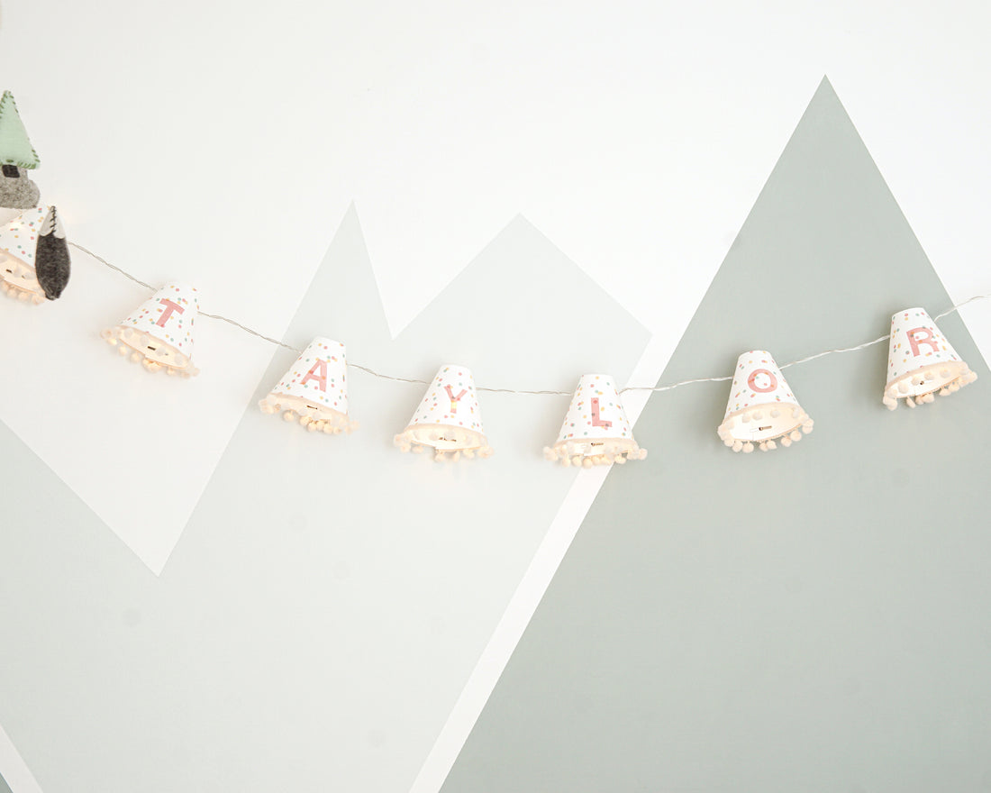 Personalised pom pom fairy lights in pink