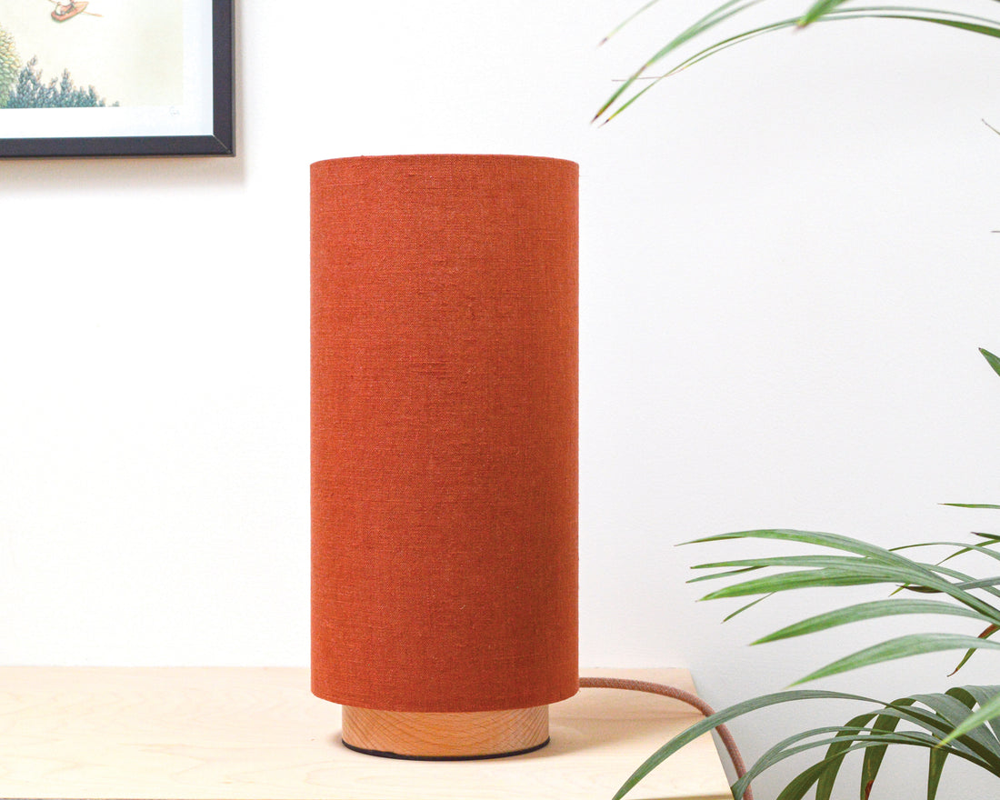 Rust linen slim table lamp, with wooden base