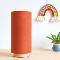 Rust linen slim table lamp, with wooden base