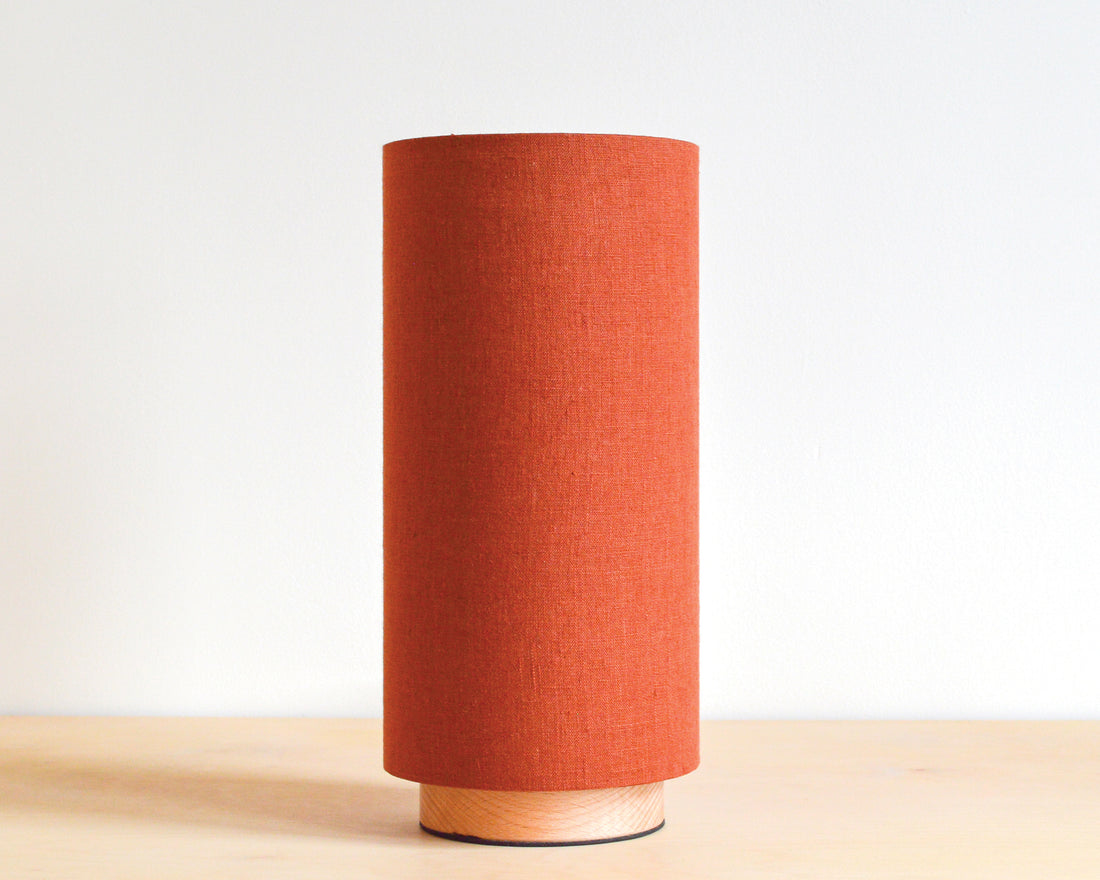 Rust linen slim table lamp, with wooden base