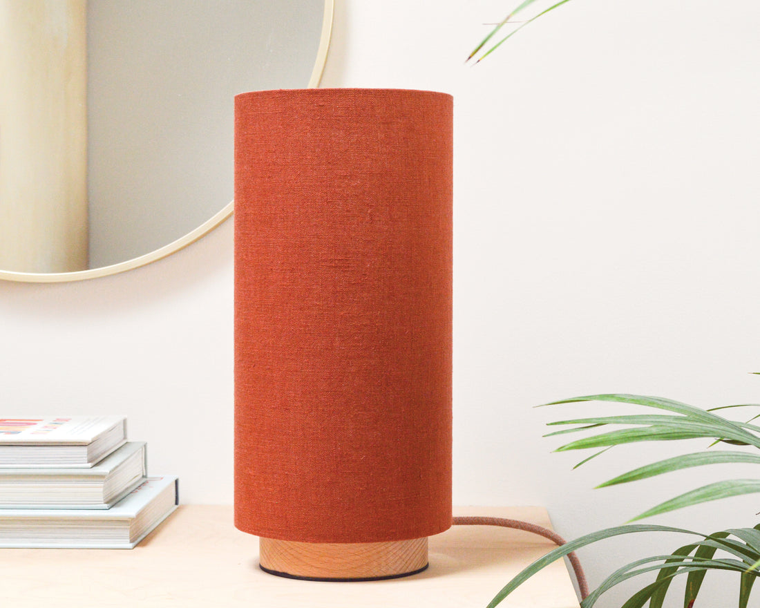 Rust linen slim table lamp, with wooden base