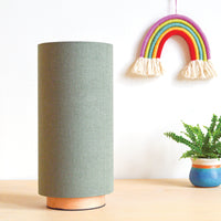 Sage green linen slim table lamp, with wooden base