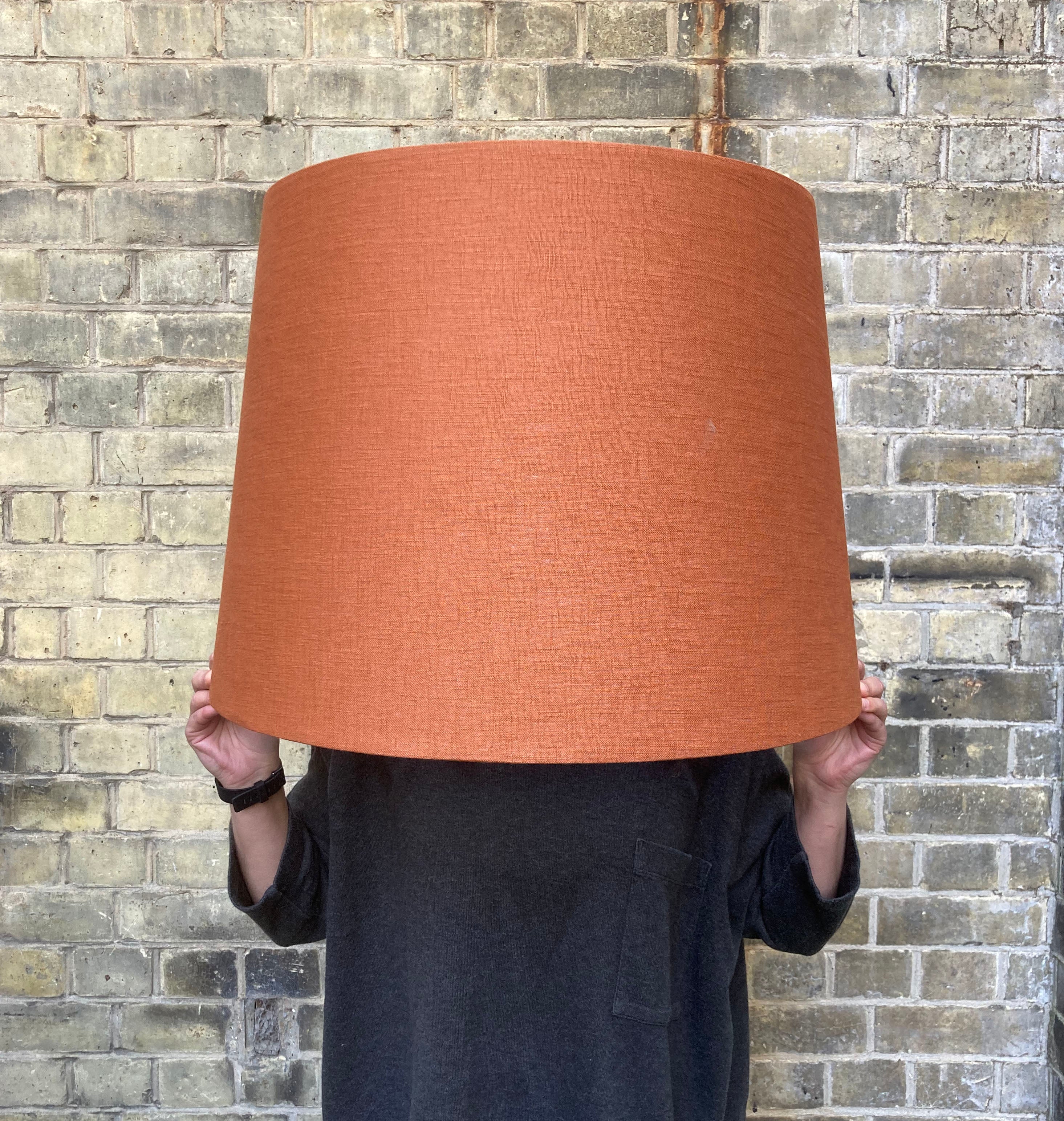 Bespoke lampshade made in orange rust linen