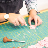 Carving lino during printed lampshade workshop starling studio