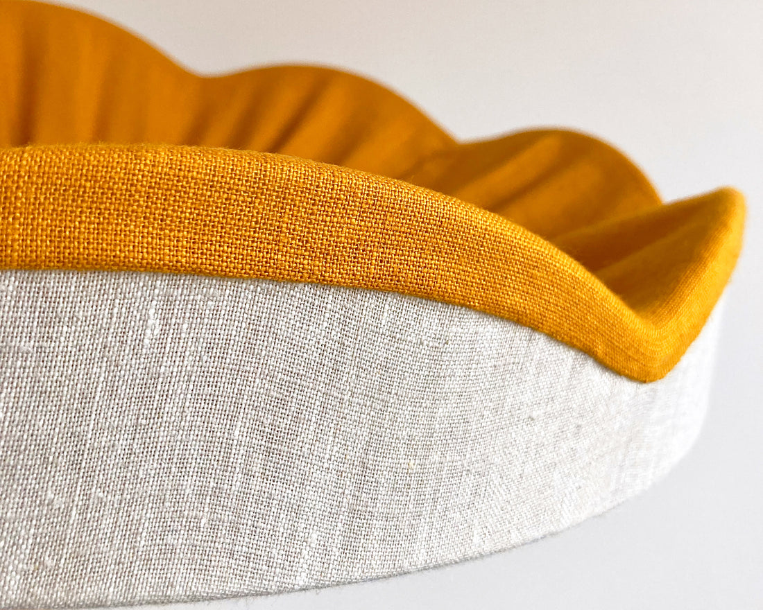 Close up details of the mustard scallop on our natural linen pleated lampshade