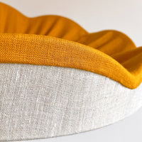 Close up details of the mustard scallop on our natural linen pleated lampshade