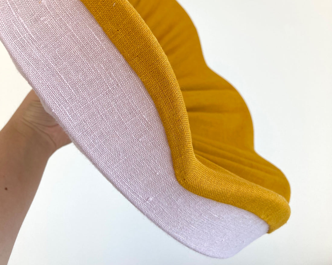 Close up of the scallop linen detail in our pink and mustard lampshade