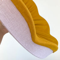 Close up of the scallop linen detail in our pink and mustard lampshade