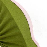 Detail of the pink linen scallop edge on our green moss pleated lampshade