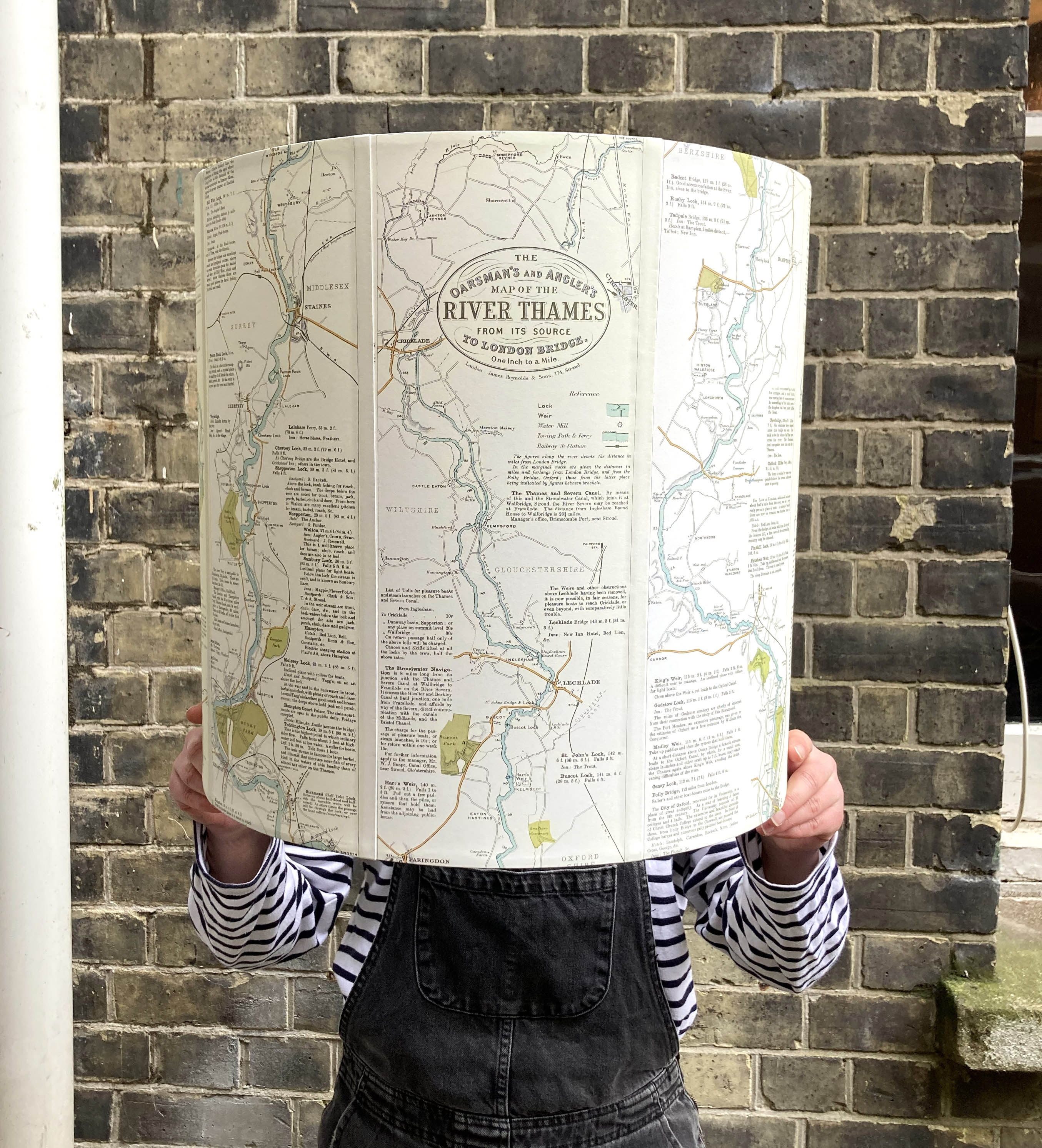 Large bespoke lampshade made from paper maps