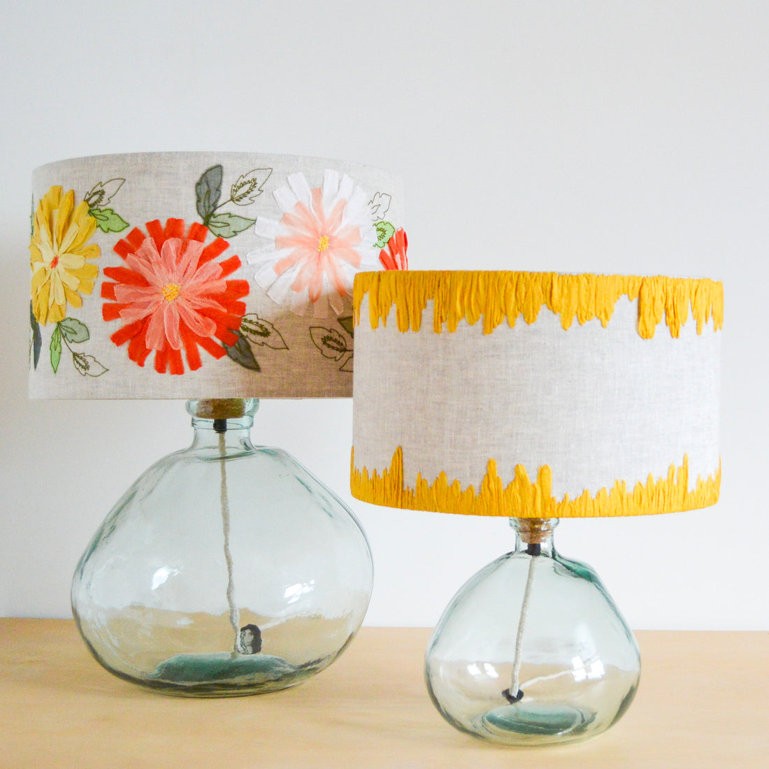 Pink floral embroidered lampshade and yellow edged embroidered lampshade