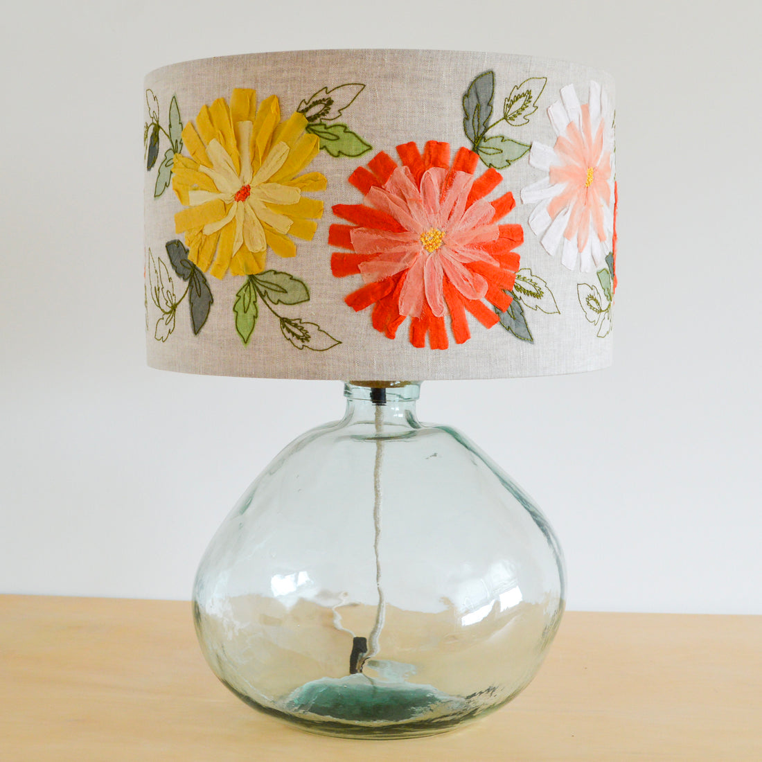 This linen lampshade features Pink, Yellow and orange embroidered flowers