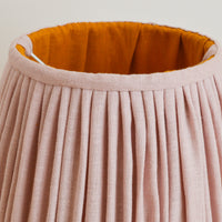 Close up detail of pink and mustard gathered linen french drum lampshade