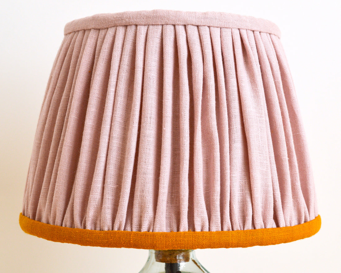 Dusty pink gathered lampshade with a mustard edge detail