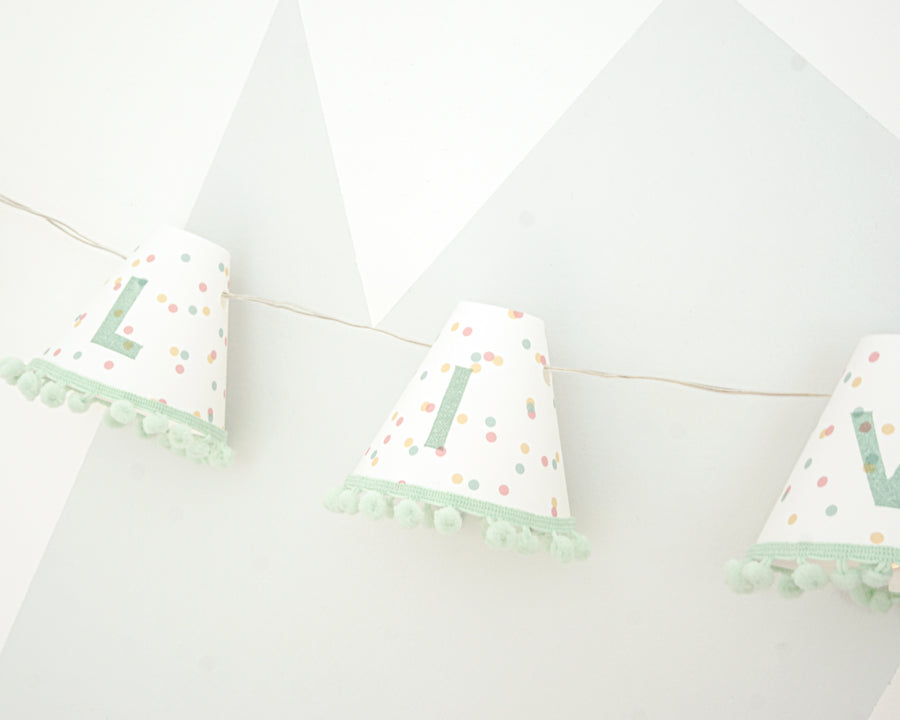 Personalised pom pom fairy lights in green