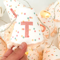 Personalised pom pom fairy lights in pink