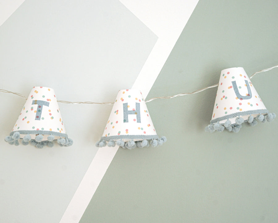 Personalised pom pom fairy lights in blue