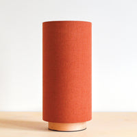 Rust linen slim table lamp, with wooden base
